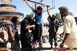 Christians being crucified by ISIS